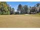 Picturesque golf course with manicured greens and mature trees at 8795 E Fairway Woods Cir, North Charleston, SC 29420