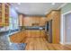 Updated kitchen with granite counters, stainless steel appliances and beautiful wood cabinets at 8795 E Fairway Woods Cir, North Charleston, SC 29420