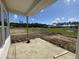 Open patio area with views of the land still under construction and a pond in the distance at 941 Dusk Dr, Summerville, SC 29486