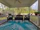 Relaxing back porch perfect for outdoor seating and enjoyment of the backyard at 104 Queen Mary Ct, Summerville, SC 29485