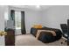 Cozy bedroom with a window, neutral walls, and simple furnishings, perfect for relaxation and restful nights at 104 Queen Mary Ct, Summerville, SC 29485
