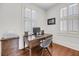 Office with hardwood floors and two windows with plantation shutters at 106 Beaufain St, Charleston, SC 29401