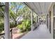 Inviting porch with beautiful landscaping views providing the perfect outdoor space at 106 Beaufain St, Charleston, SC 29401