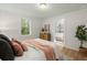Comfortable bedroom with a view into an adjacent bathroom at 109 Gerideau St, Walterboro, SC 29488