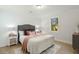 Cozy bedroom with a plush bed, soft lighting, and views of the outside scenery at 109 Gerideau St, Walterboro, SC 29488