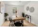 Contemporary dining room with modern table, decor, and bright, neutral colors at 109 Gerideau St, Walterboro, SC 29488