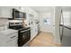 Bright, modern kitchen featuring stainless steel appliances and a stylish black faucet at 109 Gerideau St, Walterboro, SC 29488