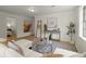 Elegant living room with hardwood floors, neutral walls, a cozy sectional, and stylish accents at 109 Gerideau St, Walterboro, SC 29488