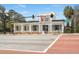 Walterboro Wildlife Center building with modern architecture, white pergola, and clear signage, located at a crossroads at 109 Gerideau St, Walterboro, SC 29488