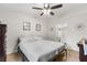 Bright bedroom features hardwood floors and decorative wall art at 109 Sawmill Dr, Summerville, SC 29483