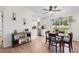 Bright dining room with open access to kitchen and plenty of natural light from sliding glass doors at 109 Sawmill Dr, Summerville, SC 29483