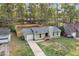 Ranch style home featuring an attached garage, a new fence, and a landscaped front yard at 109 Sawmill Dr, Summerville, SC 29483
