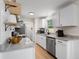 Well-lit kitchen with granite countertops, a stainless steel dishwasher, and a double-basin sink at 109 Sawmill Dr, Summerville, SC 29483