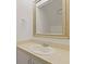 Bathroom featuring a sink with gold trim mirror, countertop, sink and towel ring at 1120 Hidden Cove Dr # I, Mount Pleasant, SC 29464