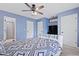 Bedroom featuring a ceiling fan, television and ensuite bathroom at 1120 Hidden Cove Dr # I, Mount Pleasant, SC 29464