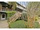 The home's exterior features a wooden staircase, greenery, and well-maintained landscaping at 1120 Hidden Cove Dr # I, Mount Pleasant, SC 29464