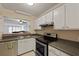 Functional kitchen with stainless steel appliances, including stove, and ample cabinet space at 1120 Hidden Cove Dr # I, Mount Pleasant, SC 29464