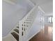 Staircase with light blue walls, white banister and dark wood and tile flooring at 1120 Hidden Cove Dr # I, Mount Pleasant, SC 29464
