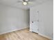 Bedroom featuring neutral decor, wood floors, and a ceiling fan offering a clean and simple living space at 1133 Mount Batten Dr, Hanahan, SC 29410