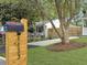 Charming home address sign and mailbox with tree in yard at 1133 Mount Batten Dr, Hanahan, SC 29410