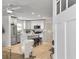 Modern kitchen featuring stainless steel appliances, a central island, and a view from the front door at 1133 Mount Batten Dr, Hanahan, SC 29410