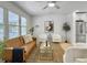 Inviting living area with a comfortable sofa, modern decor, and a kitchen area at 1133 Mount Batten Dr, Hanahan, SC 29410