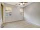 Bedroom with neutral walls, carpeted floor, ceiling fan, and two windows that provide natural light at 115 Foxborough Rd, Goose Creek, SC 29445
