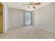 Bedroom with neutral walls, carpeted floor and curtains over windows for privacy at 115 Foxborough Rd, Goose Creek, SC 29445