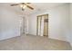 Bedroom with neutral walls, carpeted floor, closet and ceiling fan at 115 Foxborough Rd, Goose Creek, SC 29445