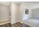 Hallway with neutral walls, tile and carpet flooring at 115 Foxborough Rd, Goose Creek, SC 29445