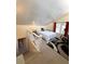 Bedroom on the upper floor with stairs leading down and a small bathroom next to it at 1291 Old Colony Rd, Mount Pleasant, SC 29464