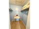 Walk-in closet with a small desk and shelving for storage in a compact space at 1291 Old Colony Rd, Mount Pleasant, SC 29464