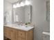 Bathroom featuring a wooden vanity with a marble countertop and brushed nickel fixtures at 1330 Sea Elder Dr # C, Kiawah Island, SC 29455