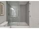 Bathroom featuring sliding glass shower doors and light gray tiling at 1330 Sea Elder Dr # C, Kiawah Island, SC 29455