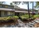 Exterior view of a well-maintained building with mature landscaping and a welcoming entrance at 1330 Sea Elder Dr # C, Kiawah Island, SC 29455