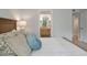 Comfortable main bedroom showcases a glimpse into the ensuite bathroom at 1330 Sea Elder Dr # C, Kiawah Island, SC 29455