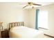 Bedroom featuring a double bed with a bedside table and a bright window at 1438 Arrow Wind Ter, Charleston, SC 29414