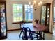 Traditional dining room featuring a wood table set and vintage china cabinets at 1438 Arrow Wind Ter, Charleston, SC 29414