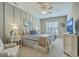 Inviting bedroom with soft, neutral tones, a plush bed, and a ceiling fan for comfortable living at 145 Billowing Sails St, Summerville, SC 29486