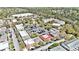 Aerial view of commercial buildings, parking lots, and nearby buildings, surrounded by lush greenery at 1501 Sea Palms Cres, Mount Pleasant, SC 29464