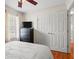 Bedroom with hardwood floors, double closets and a dresser at 1515 Wakendaw Rd, Mount Pleasant, SC 29464