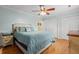 Comfortable bedroom with hardwood floors, a ceiling fan, and a neutral color scheme at 1515 Wakendaw Rd, Mount Pleasant, SC 29464