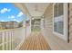 Relaxing balcony with white railings, providing neighborhood views and fresh air at 154 Old Jackson Rd, Goose Creek, SC 29445