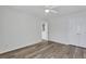 Bedroom with neutral walls, wood-look flooring, a ceiling fan, and closet at 154 Old Jackson Rd, Goose Creek, SC 29445