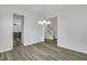Open dining area with stylish chandelier and views of the staircase at 154 Old Jackson Rd, Goose Creek, SC 29445