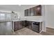 Elegant kitchen with modern appliances, dark wood cabinets, and breakfast bar area at 154 Old Jackson Rd, Goose Creek, SC 29445
