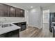 Contemporary kitchen with stainless steel appliances, quartz countertops, and dark cabinetry at 154 Old Jackson Rd, Goose Creek, SC 29445