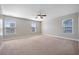 Spacious bedroom with carpet flooring, and plenty of natural light through multiple windows at 158 Netherfield Dr, Summerville, SC 29486