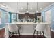 Bright kitchen featuring granite counters, stainless appliances, and an island with bar seating at 158 Netherfield Dr, Summerville, SC 29486