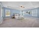 Airy main bedroom with tray ceiling, natural light, and a cozy aesthetic at 158 Netherfield Dr, Summerville, SC 29486